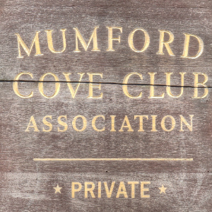 Scenic view of Mumford Cove, a private waterfront community in Groton, CT, showcasing its beautiful coastline and tranquil residential atmosphere